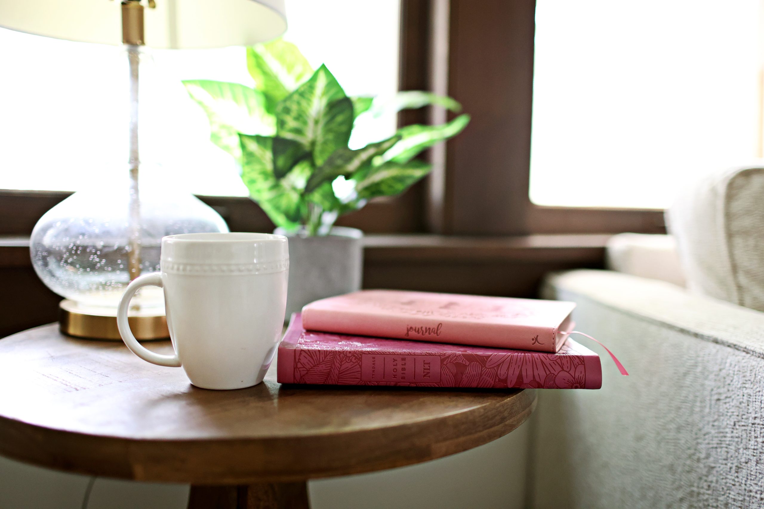 Laptop and coffee in a comfortable therapy workspace